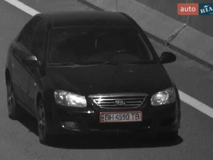 Чорний Кіа Черато, об'ємом двигуна 1.6 л та пробігом 337 тис. км за 5000 $, фото 1 на Automoto.ua