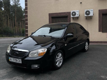 Черный Киа Черато, объемом двигателя 1.59 л и пробегом 273 тыс. км за 2999 $, фото 1 на Automoto.ua