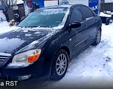 Черный Киа Черато, объемом двигателя 2 л и пробегом 1670 тыс. км за 5200 $, фото 1 на Automoto.ua