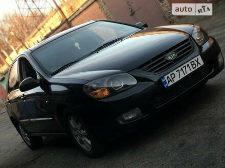Чорний Кіа Черато, об'ємом двигуна 2 л та пробігом 232 тис. км за 4500 $, фото 1 на Automoto.ua