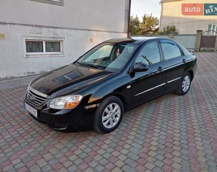 Черный Киа Черато, объемом двигателя 1.6 л и пробегом 208 тыс. км за 3900 $, фото 1 на Automoto.ua