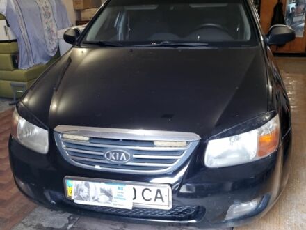 Черный Киа Черато, объемом двигателя 1 л и пробегом 193 тыс. км за 4600 $, фото 1 на Automoto.ua
