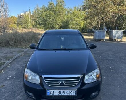 Чорний Кіа Черато, об'ємом двигуна 2 л та пробігом 310 тис. км за 3400 $, фото 1 на Automoto.ua