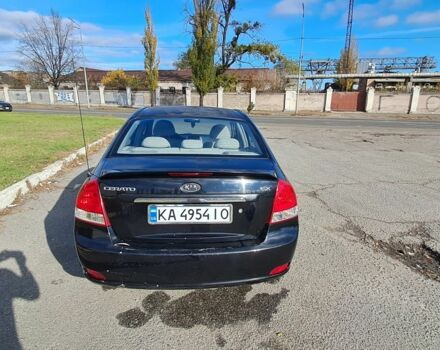 Черный Киа Черато, объемом двигателя 1.6 л и пробегом 258 тыс. км за 4300 $, фото 1 на Automoto.ua