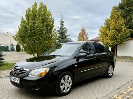 Черный Киа Черато, объемом двигателя 1.6 л и пробегом 320 тыс. км за 3500 $, фото 1 на Automoto.ua