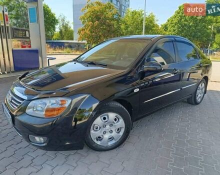 Черный Киа Черато, объемом двигателя 1.59 л и пробегом 219 тыс. км за 4600 $, фото 1 на Automoto.ua