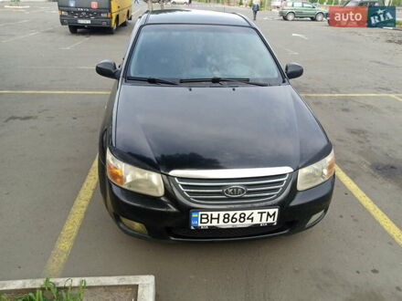 Черный Киа Черато, объемом двигателя 1.59 л и пробегом 223 тыс. км за 4400 $, фото 1 на Automoto.ua
