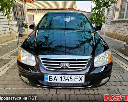 Черный Киа Черато, объемом двигателя 2 л и пробегом 205 тыс. км за 4500 $, фото 1 на Automoto.ua