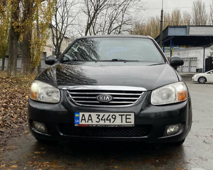 Черный Киа Черато, объемом двигателя 1.98 л и пробегом 306 тыс. км за 3800 $, фото 1 на Automoto.ua