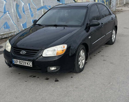 Черный Киа Черато, объемом двигателя 1.58 л и пробегом 258 тыс. км за 3300 $, фото 1 на Automoto.ua