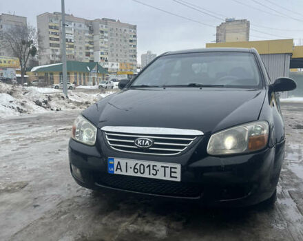Черный Киа Черато, объемом двигателя 1.6 л и пробегом 252 тыс. км за 2850 $, фото 1 на Automoto.ua