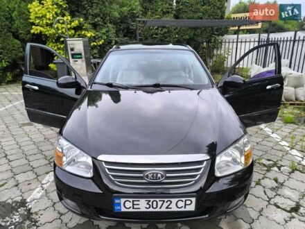 Чорний Кіа Черато, об'ємом двигуна 1.6 л та пробігом 318 тис. км за 3506 $, фото 1 на Automoto.ua