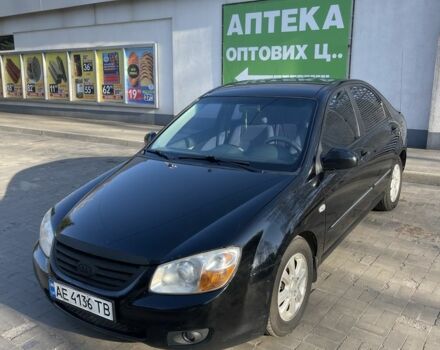 Черный Киа Черато, объемом двигателя 1.6 л и пробегом 260 тыс. км за 4000 $, фото 1 на Automoto.ua