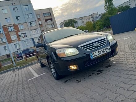 Чорний Кіа Черато, об'ємом двигуна 1.6 л та пробігом 219 тис. км за 2952 $, фото 1 на Automoto.ua