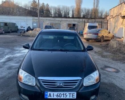 Черный Киа Черато, объемом двигателя 1.59 л и пробегом 253 тыс. км за 2500 $, фото 1 на Automoto.ua