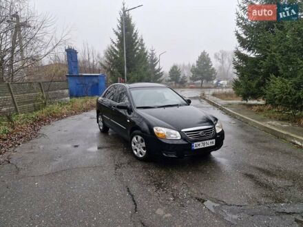 Черный Киа Черато, объемом двигателя 1.6 л и пробегом 280 тыс. км за 4300 $, фото 1 на Automoto.ua