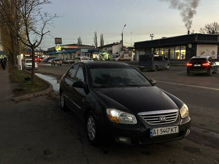 Черный Киа Черато, объемом двигателя 1.6 л и пробегом 294 тыс. км за 3500 $, фото 1 на Automoto.ua