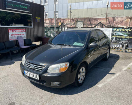 Черный Киа Черато, объемом двигателя 1.59 л и пробегом 210 тыс. км за 4100 $, фото 1 на Automoto.ua