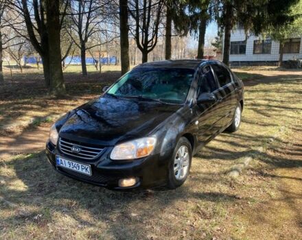 Черный Киа Черато, объемом двигателя 2 л и пробегом 217 тыс. км за 3300 $, фото 1 на Automoto.ua