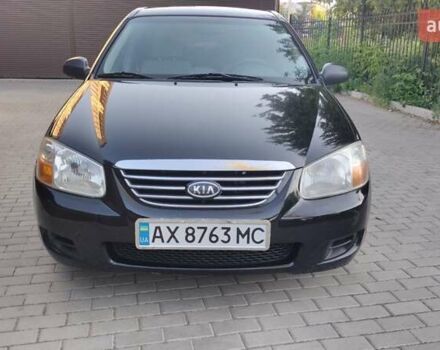 Чорний Кіа Черато, об'ємом двигуна 1.6 л та пробігом 204 тис. км за 4900 $, фото 1 на Automoto.ua