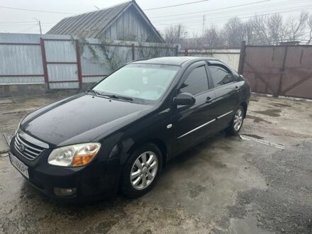 Черный Киа Черато, объемом двигателя 2 л и пробегом 262 тыс. км за 4800 $, фото 1 на Automoto.ua