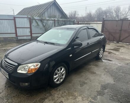 Черный Киа Черато, объемом двигателя 2 л и пробегом 262 тыс. км за 4800 $, фото 1 на Automoto.ua