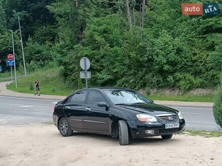 Черный Киа Черато, объемом двигателя 2 л и пробегом 298 тыс. км за 4250 $, фото 1 на Automoto.ua