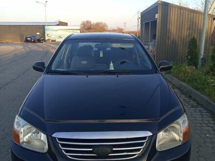 Черный Киа Черато, объемом двигателя 1.6 л и пробегом 232 тыс. км за 4250 $, фото 1 на Automoto.ua