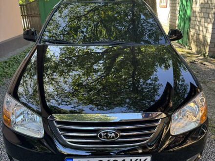 Черный Киа Черато, объемом двигателя 1.6 л и пробегом 16 тыс. км за 8000 $, фото 1 на Automoto.ua