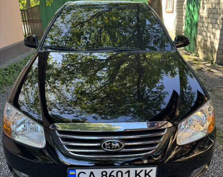 Черный Киа Черато, объемом двигателя 1.6 л и пробегом 16 тыс. км за 8000 $, фото 1 на Automoto.ua