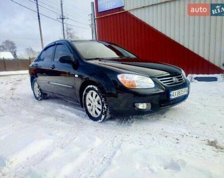 Черный Киа Черато, объемом двигателя 1.6 л и пробегом 205 тыс. км за 5200 $, фото 1 на Automoto.ua