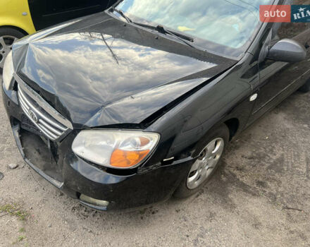 Чорний Кіа Черато, об'ємом двигуна 1.6 л та пробігом 240 тис. км за 2500 $, фото 1 на Automoto.ua