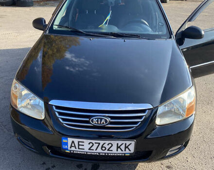 Черный Киа Черато, объемом двигателя 1.59 л и пробегом 255 тыс. км за 3500 $, фото 1 на Automoto.ua