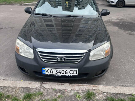 Черный Киа Черато, объемом двигателя 2 л и пробегом 220 тыс. км за 3400 $, фото 1 на Automoto.ua