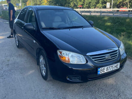 Черный Киа Черато, объемом двигателя 1.58 л и пробегом 260 тыс. км за 5000 $, фото 1 на Automoto.ua