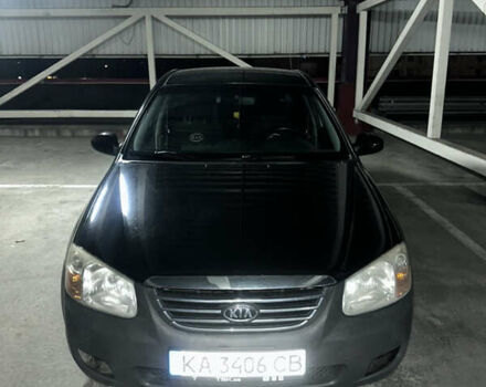 Черный Киа Черато, объемом двигателя 2 л и пробегом 220 тыс. км за 3300 $, фото 1 на Automoto.ua