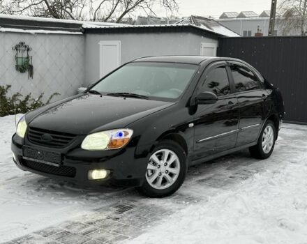 Черный Киа Черато, объемом двигателя 2 л и пробегом 183 тыс. км за 5999 $, фото 1 на Automoto.ua