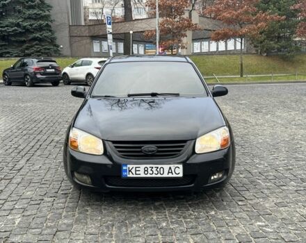 Чорний Кіа Черато, об'ємом двигуна 1.6 л та пробігом 300 тис. км за 4700 $, фото 1 на Automoto.ua