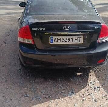 Чорний Кіа Черато, об'ємом двигуна 2 л та пробігом 200 тис. км за 3700 $, фото 1 на Automoto.ua