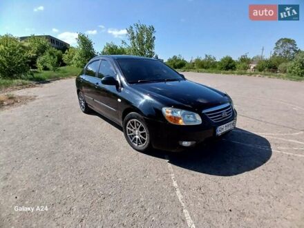 Черный Киа Черато, объемом двигателя 1.6 л и пробегом 225 тыс. км за 5200 $, фото 1 на Automoto.ua