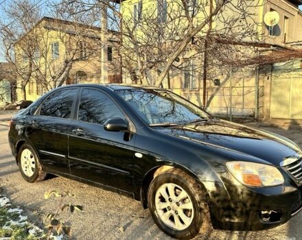 Черный Киа Черато, объемом двигателя 1.6 л и пробегом 305 тыс. км за 3700 $, фото 1 на Automoto.ua