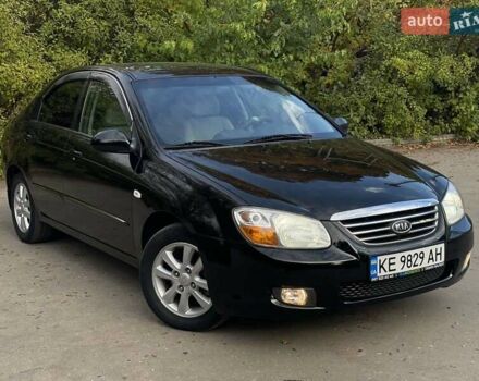 Чорний Кіа Черато, об'ємом двигуна 2 л та пробігом 173 тис. км за 5400 $, фото 1 на Automoto.ua