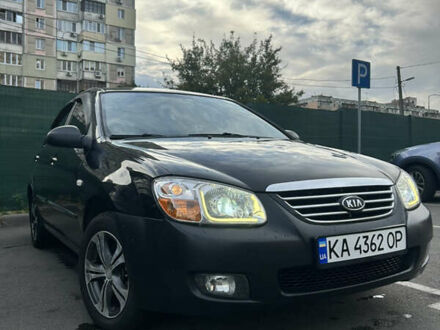Черный Киа Черато, объемом двигателя 1.58 л и пробегом 350 тыс. км за 4500 $, фото 1 на Automoto.ua