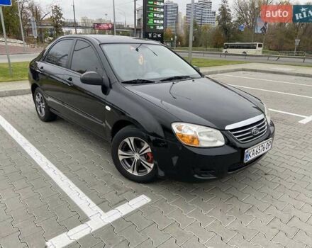 Черный Киа Черато, объемом двигателя 1.6 л и пробегом 200 тыс. км за 4000 $, фото 1 на Automoto.ua