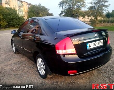 Черный Киа Черато, объемом двигателя 1.6 л и пробегом 272 тыс. км за 4700 $, фото 1 на Automoto.ua