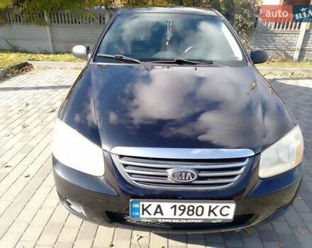 Черный Киа Черато, объемом двигателя 1.6 л и пробегом 335 тыс. км за 5500 $, фото 1 на Automoto.ua