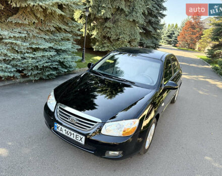 Черный Киа Черато, объемом двигателя 2 л и пробегом 110 тыс. км за 6300 $, фото 1 на Automoto.ua