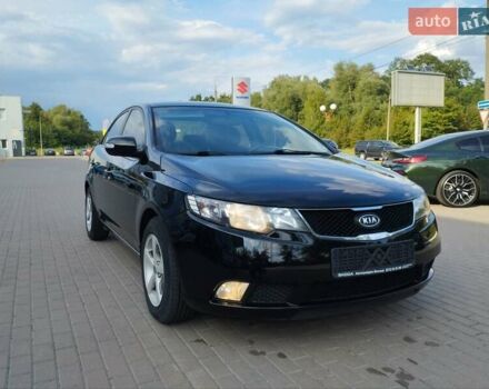Черный Киа Черато, объемом двигателя 1.6 л и пробегом 189 тыс. км за 6100 $, фото 1 на Automoto.ua