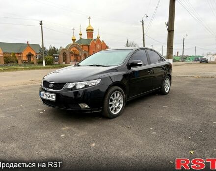 Черный Киа Черато, объемом двигателя 1.6 л и пробегом 200 тыс. км за 5650 $, фото 1 на Automoto.ua