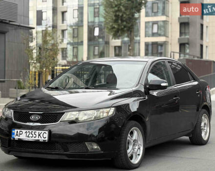 Черный Киа Черато, объемом двигателя 1.59 л и пробегом 182 тыс. км за 5200 $, фото 1 на Automoto.ua